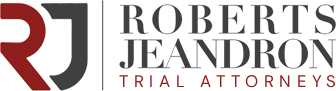 Roberts Jeandron Trial Attorneys Logo